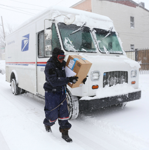 Newspaper, mail carriers slowed by snow